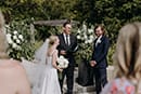 bride and groom in their wedding ceremony happily in the moment- Hawke's Bay Wedding