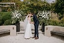 bride and groom in their first kiss as husband and wife- Hawke's Bay Wedding