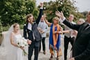 bride and groom greeted happily by their guests as newly husband and wife- Hawke's Bay Wedding