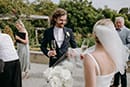 bride and groom drinking wine to celebrate their wedding- Hawke's Bay Wedding