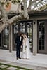 bride and groom kissing under the tree- Hawke's Bay Wedding