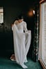 bride admiring her bridal dress- Waikanae Wedding