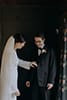 bride admiring her groom's suit- Waikanae Wedding