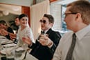 bride and groom happily talking with their guests- Waikanae Wedding