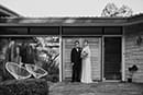 bride and groom standing outside their wedding venue-Waikanae Wedding