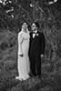 bride and groom standing in the middle of the forest- Waikanae Wedding