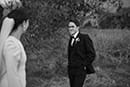 bride and groom laughing in the middle of the forest- Waikanae Wedding