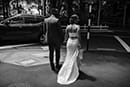 bride and groom walking in the streets- New Zealand Elopements