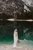 bride looking back in the wonders of the dolomites- New Zealand Elopements