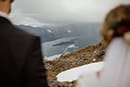 bride and groom looking at the wonders of nature- New Zealand Elopements