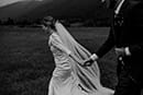 bride and groom happily walking together- New Zealand Elopements